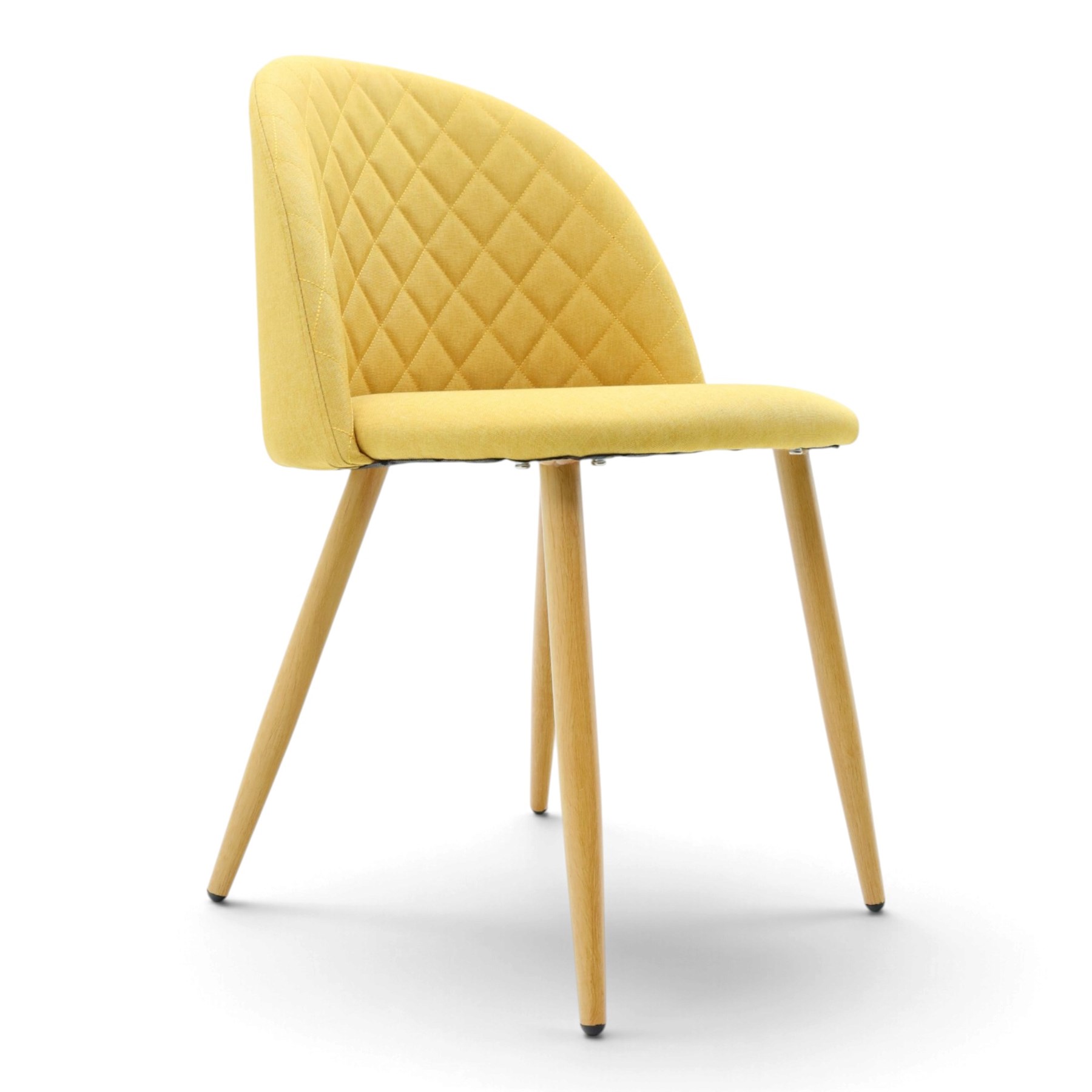 Set of four contemporary yellow upholstered dining chairs, with wrap around back with quilted stitching, padded seat raised on light oak tapering supports 