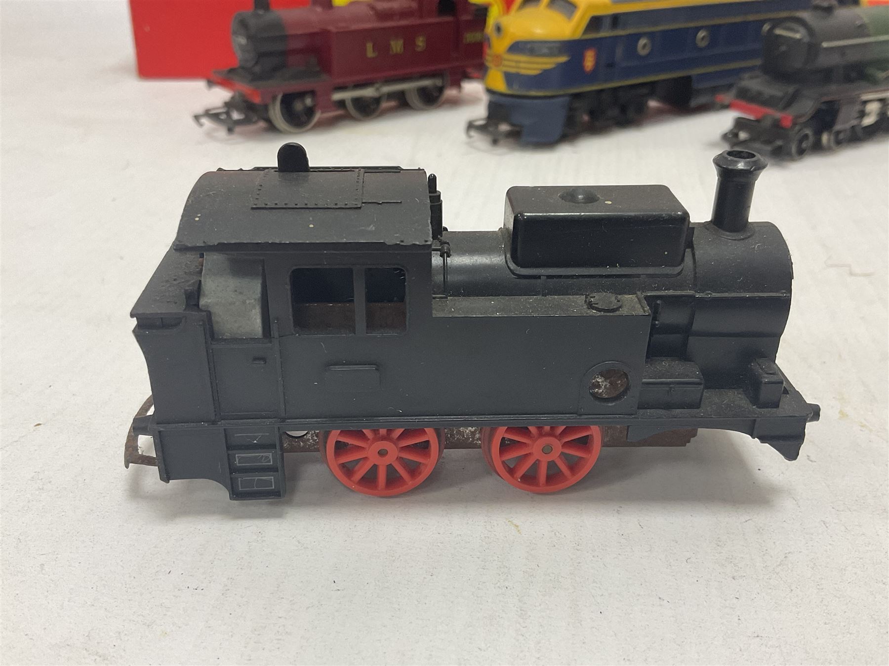 Hornby/Tri-Ang ‘00’ gauge - nine locomotives to include Britannia Class ‘Britannia’ 4-6-2 no.70000 in BR green; Class M7 4-4-0 Tank no.30027 in BR black; Princess Class ‘Princess Victoria’ 4-6-2 no.46205 in BR black; in original boxes; further loose models Princess Class ‘Princess Elizabeth’ 4-6-2 no.46201 in BR green; Class 3F 0-6-0 tank no.7606 in LMS crimson; TR double ended diesel locomotive; three further tank locomotives and one loose tender (10) 