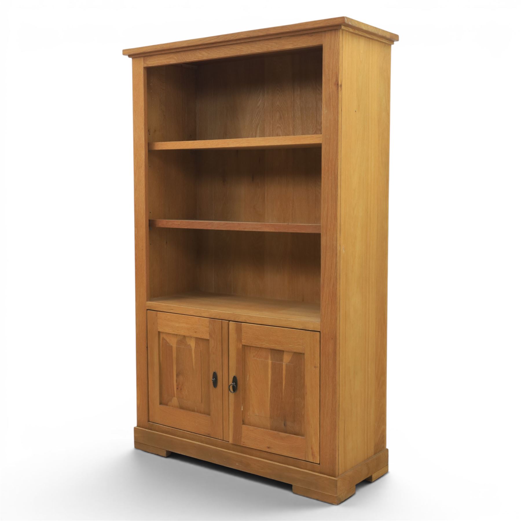 Light oak open bookcase fitted with three shelves, two cupboards, below