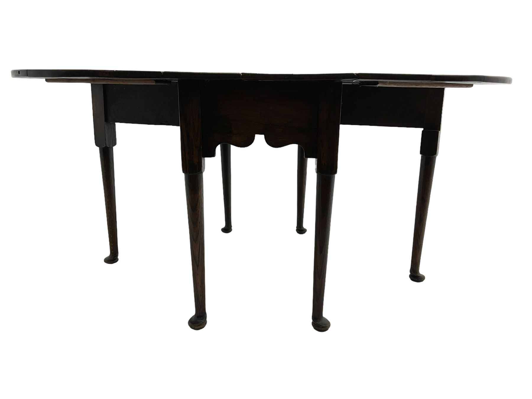 George III oak drop-leaf dining table, oval top over gate-leg action cabriole supports