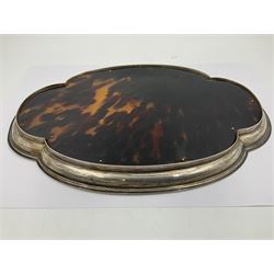 1920's silver and tortoiseshell dressing table tray, of quatrefoil form, the lobed silver edge encasing a tortoiseshell center with silver acanthus detail, hallmarked Elkington & Co Ltd, Birmingham 1921, L25cm W18cm