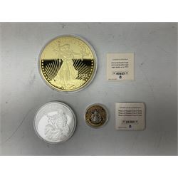 Coins including United States of America 1885 Morgan dollar, Queen Elizabeth II Bailiwick of Guernsey 20012 and 2013 five pound coins, Isle of Man Paddington Bear 2008 one crown, various other commemorative coins etc