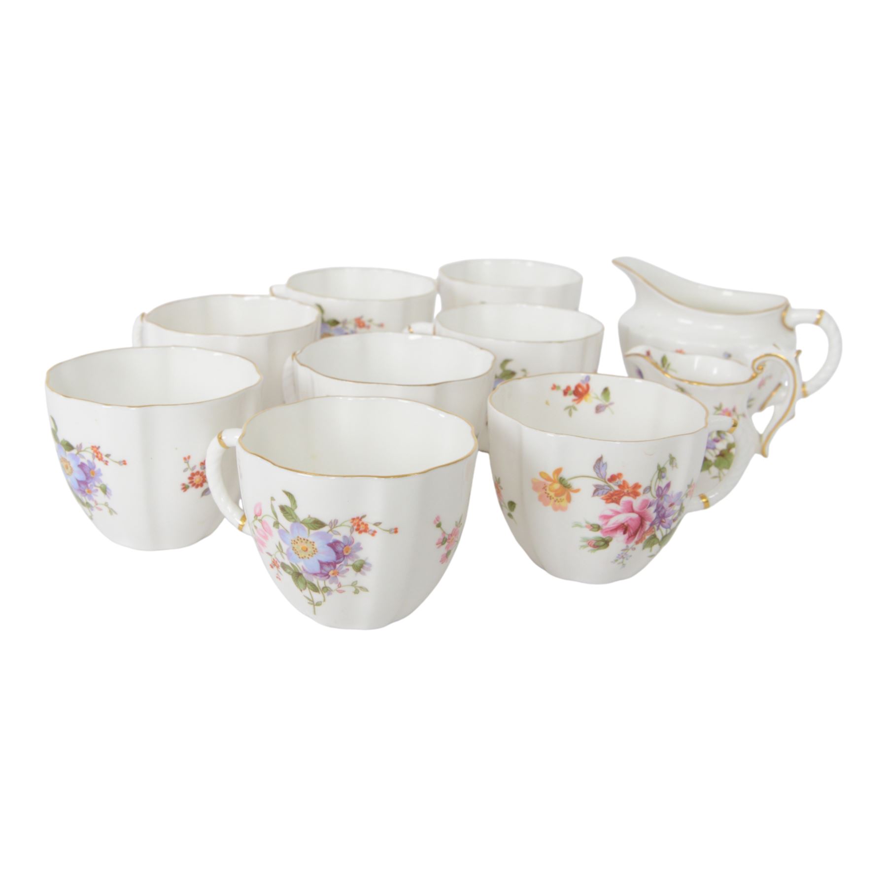 Royal Crown Derby Derby Posies tea service for ten, comprising teacups and saucers, dessert plates, two milk jugs, open sucrier cake plate and sandwich plate 