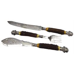 Victorian seven piece silver mounted antler handled carving set, the silver ferrules and terminals embossed with deer masks and fruit swags, hallmarked Francis Cholerton, and Mappin Brothers, Sheffield 1888, two steel blades stamoed J H Potter Cutler & Silversmith Sheffield, and one prong stamped J H Potter, contained within a fitted mahogany case with vacant brass cartouche to the hinged cover 

