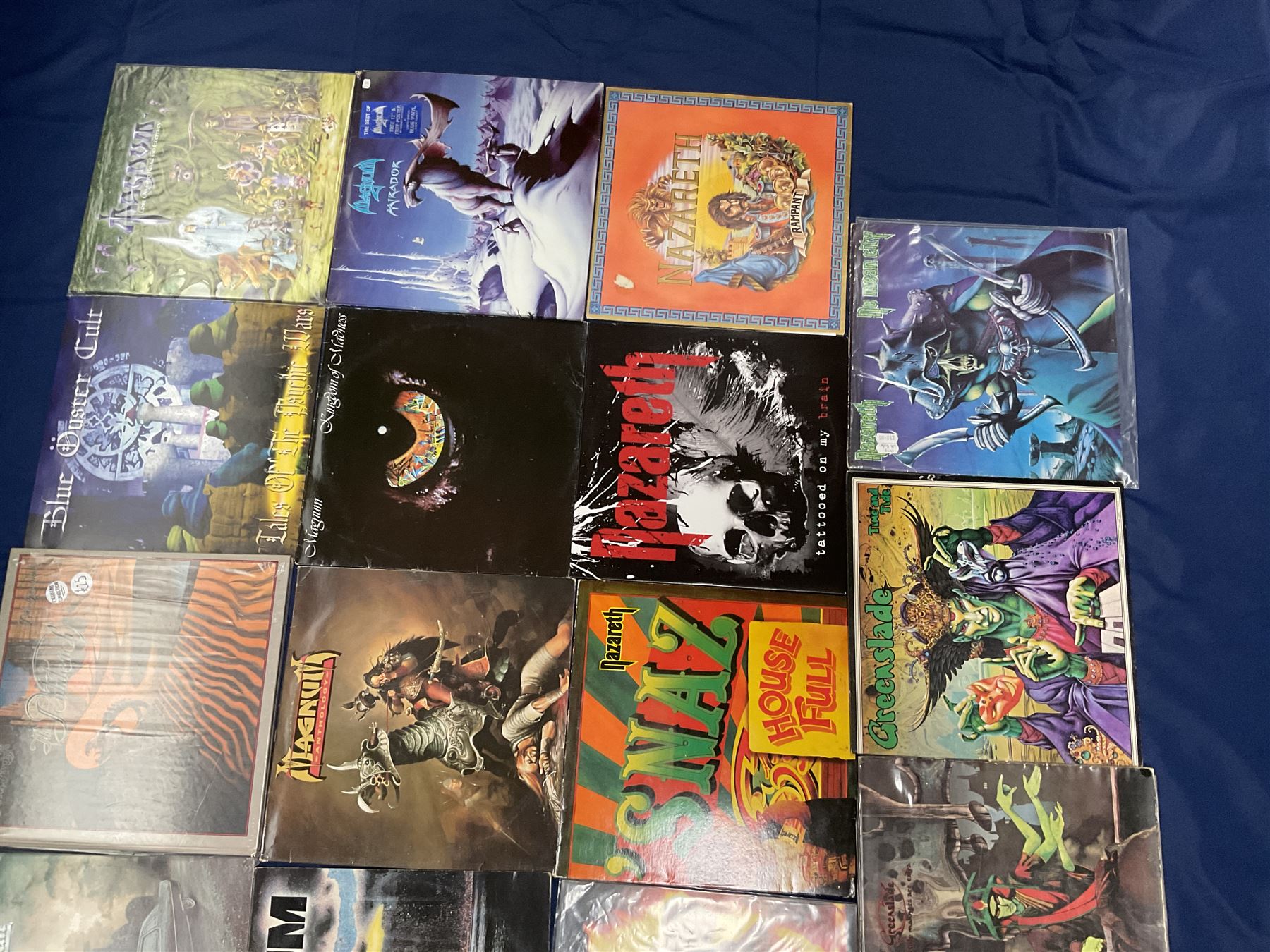 Rock, hard rock and progressive rock vinyl LPs including Greenslade 'Bedside manners are extra', 'Time and Tide', Nazareth 'No mean city', 'Close enough for Rock 'n' Roll', 'tattooed on my brain', 'Rampant', 'expect no mercy', Magnum 'Marauder', 'Anthology', 'Kingdom of Madness', 'Lost On The Road To Eternity' etc (19)