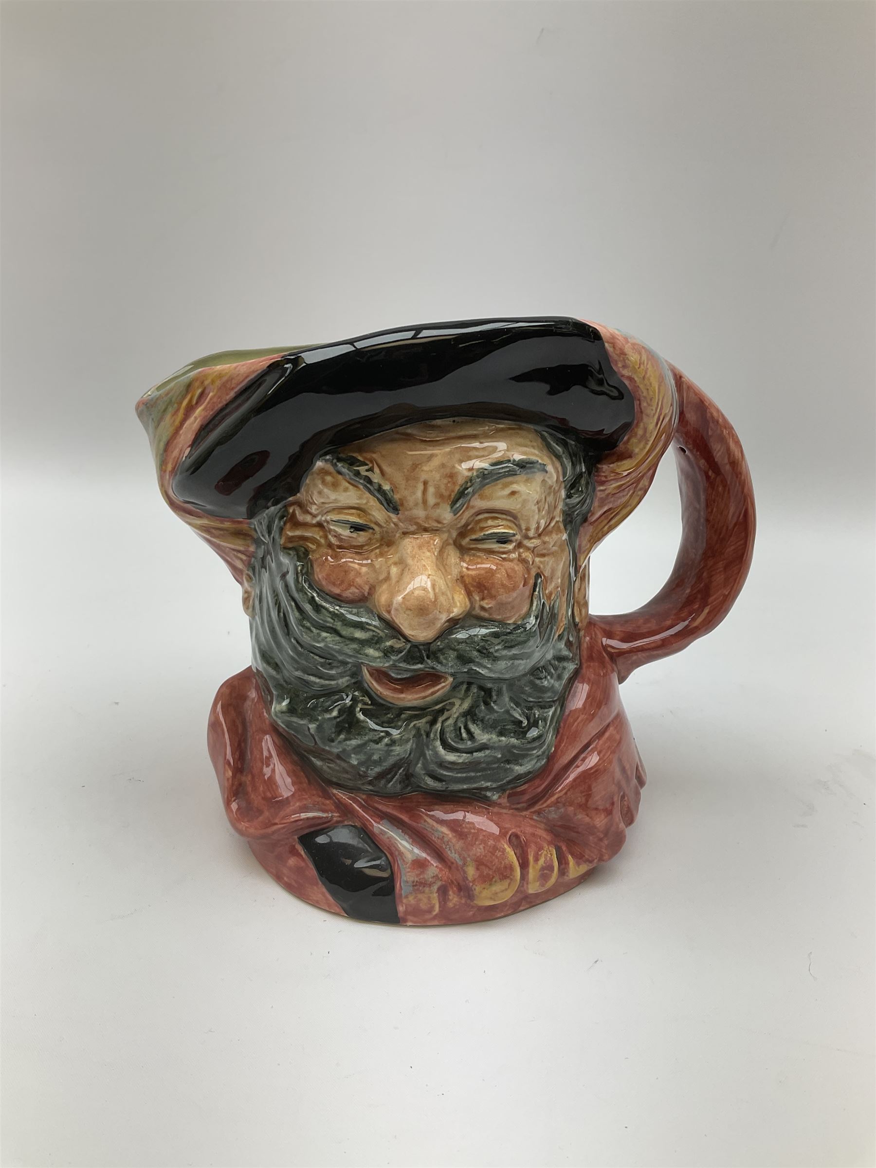 Royal Doulton toby jug of Winston Churchill H23cm and large character jug of Falstaff; together with four collector's plates by Royal Crown Derby, Royal Worcester and Limoges (6)