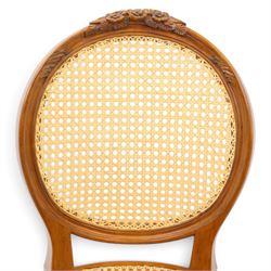 And So To Bed - French design 'Floral Caned Chair', balloon caned back with foliate carving, above a caned serpentine seat, reeded and turned supports