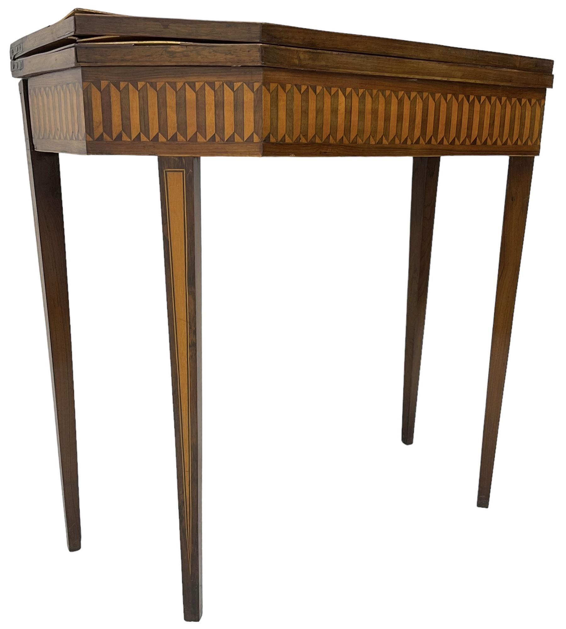 19th century inlaid mahogany card table, rectangular fold-over top with canted front corners, decorated with banded and strung edge with central inlaid fan motif, frieze decorated with geometric inlay, over a single action gate-leg base with square tapering supports