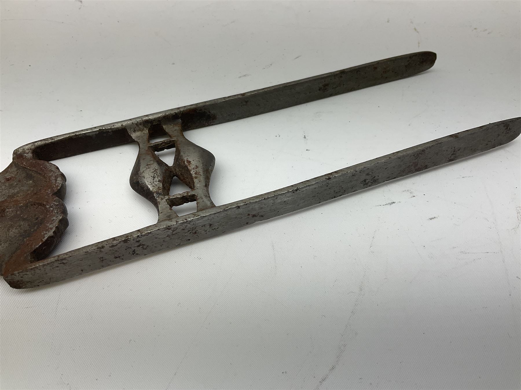 Indian thrusting dagger Katar the 25cm blade with swollen point and central rib, in leather covered wooden sheath L45cm overall