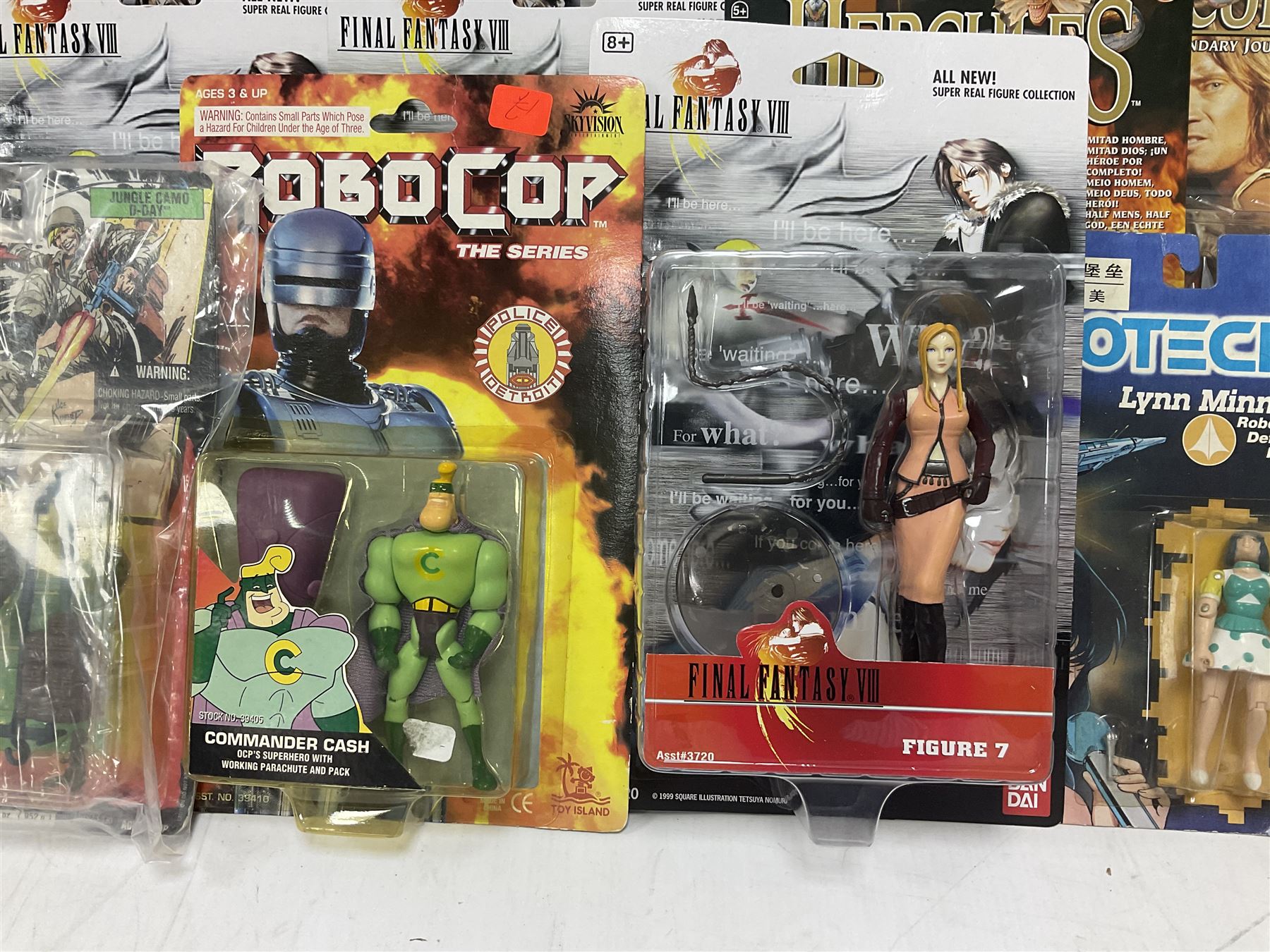 Twenty-three carded action figures including Fantasy VIII (6), Hercules (3), MIB (2), Robocop (2), The Golden Compass, The Incredibles (3), Wallace & Gromit (3), Robotech (2) and GI Joe; all in unopened blister packs (23)