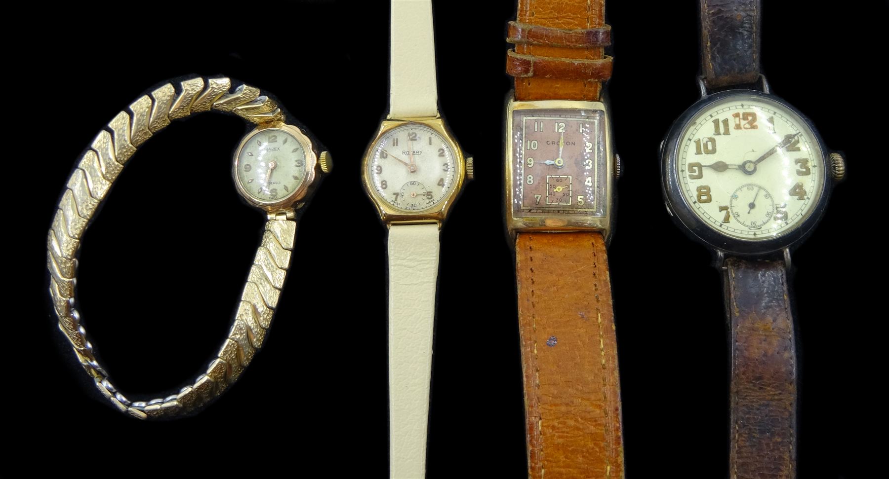 WWI silver trench watch, London import marks 1915, gold-plated Croton wristwatch and two ladies 9ct gold wristwatches, hallmarked, on leather straps (4)