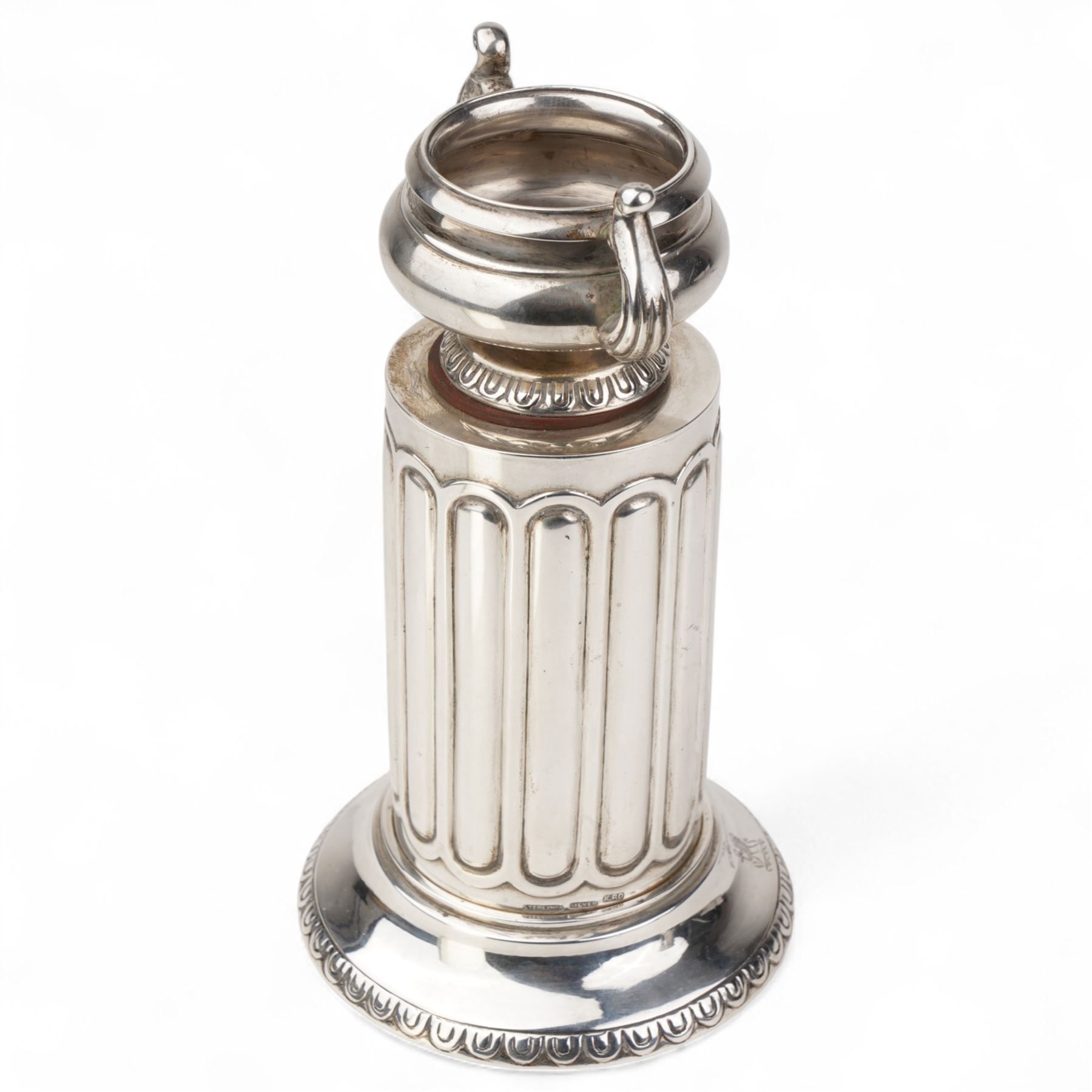 Silver Aagdan in the form of a two handled urn on a fluted circular pillar marked Sterling  Silver K.P.D. H16cm