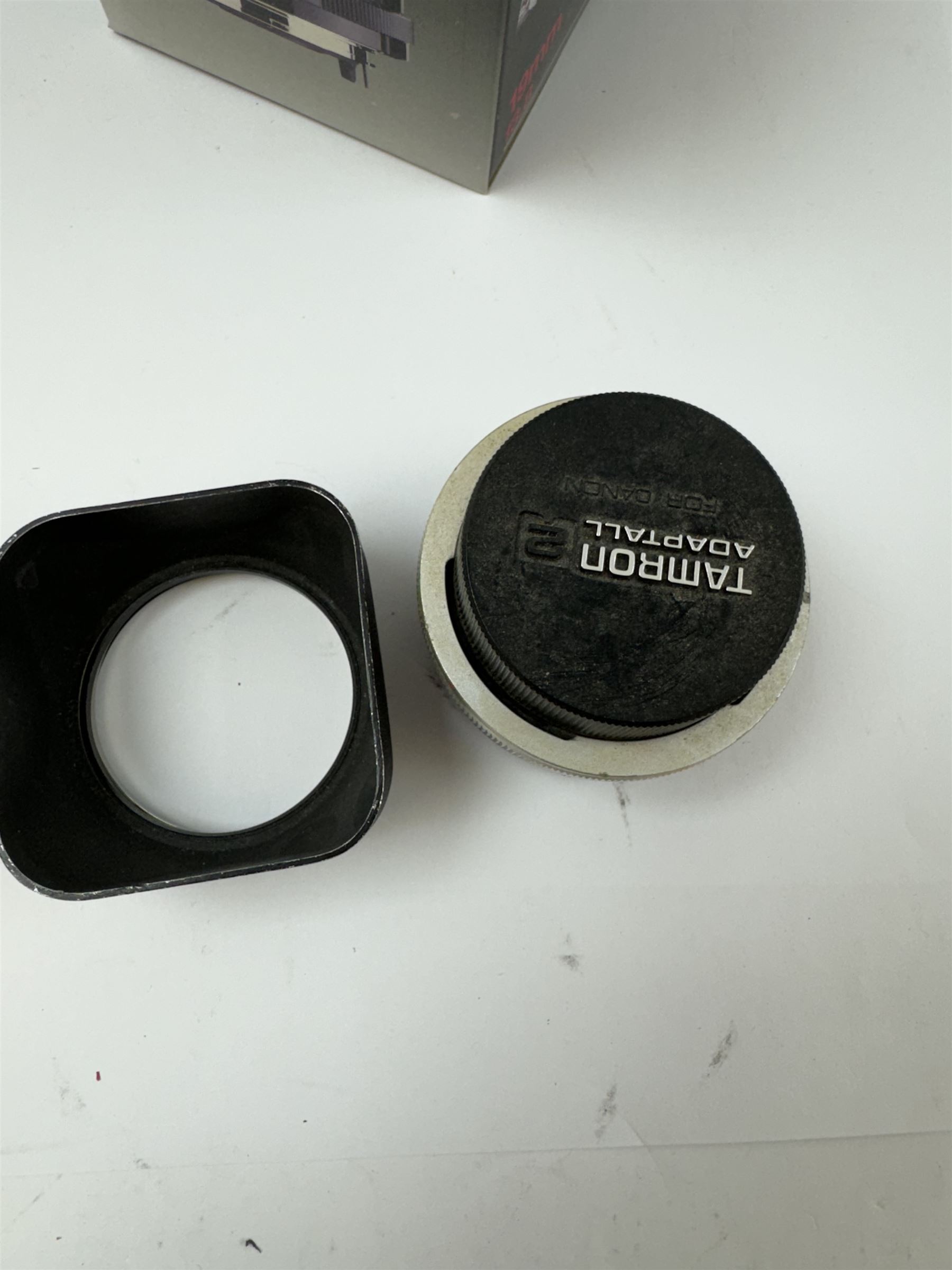 Group of camera lenses by various makers, including Vivitar 19mm 1:3.8 MC wide angle lens serial no. 97040355, boxed, Kestrel MC Auto Zoom 1:4.5 f=80-205mm lens serial no. 710269, Tokina SD 70-210mm 1:4-5.6 lens serial no. 8805753, Osawa MC 1:4.5 80-205mm Macro lens serial no. 5223217, Olympus AF zoom 28-85mm 1:3.5-4.5 lens serial no. 516854, Hanimex Tele-Lens 1:2.8 f=135mm lens serial no. H61532, together with converters and other accessories