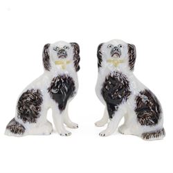 Pair of 19th century slip moulded pottery spaniels, circa 1840-1850, possibly Scottish, mo...