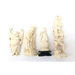  Four early 20th century carved ivory figures including Hotei, figure of a Farmer, Scholar with Staff and one other H13cm max (4)   