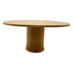 Skovby - 'SM32' late 20th century beech circular extending dining table circular segmented top turning to activate a patented spring loaded triple leaf extension stored within the cylindrical column base (Extended diameter 146cm); and set of four chairs (Width 47cm, Depth 56cm, Height 95cm, Seat height 47cm)