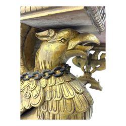 19th century Renaissance Revival carved and giltwood centre table, the rectangular top with gadrooned edge and carved frieze of repeating arched motifs with stylised scrolls, supported by a pair of carved winged griffin supports restrained by a central chained figure, on stepped rectangular bases united by carved stretcher