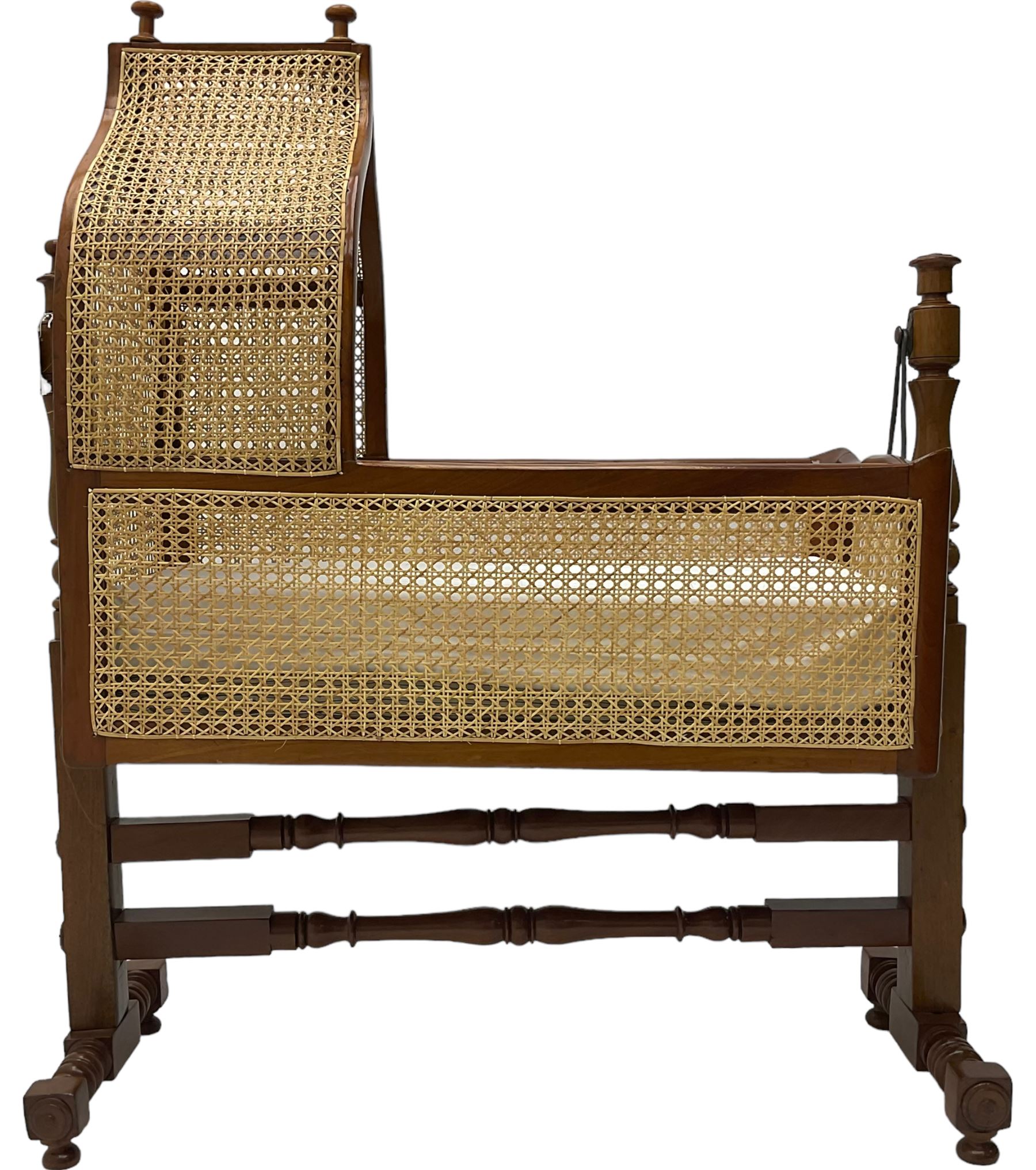 Victorian mahogany rocking crib, canework canape hood and sides