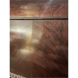 Early 19th century rosewood and brass inlaid tea caddy, of sarcophagus form, the front and hinged opening cover inlaid with brass scrolling panels, opening to reveal a compartmented interior with twin removable boxes with conforming inlaid brass detail to the hinged covers and zinc lining to the interiors, flanking a later glass mixing bowl, the whole upon four turned cylindrical feet, H21cm W36cm D20cm