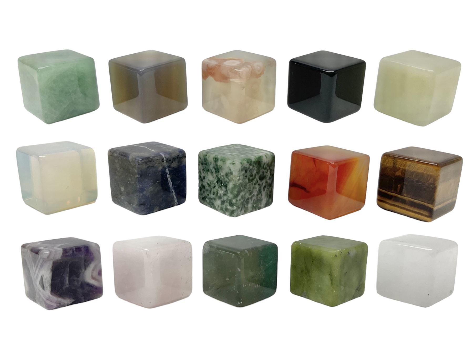 Fifteen cube mineral specimens, each cut and polished to highlight natural formations, including tiger eye, black obsidian, green aventurine, rose quartz, opalite, rhodonite etc, H2cm 
