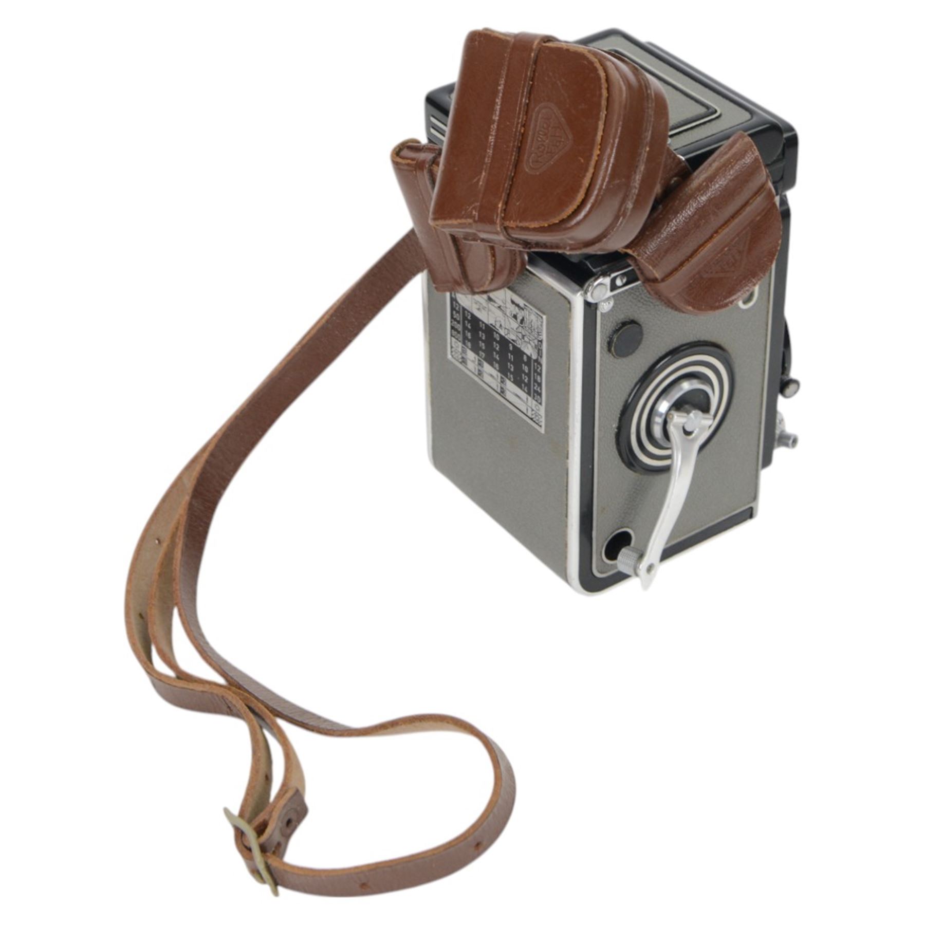 Franke & Heidecke Rolleiflex TLR camera serial no. T2132262, with a Carl Zeiss Tessar 1:3.5 f=75mm lens no. 2706070 and a Heidosmat 1:2.8/75 lens no. 3003199, contained within a leather carry case with folding lens caps and Rolleifix pistol grip