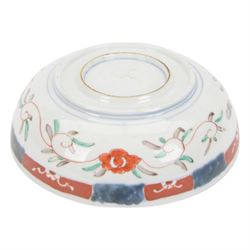 Japaneses imari bowl, decorated to the interior with a crane within a landscape, birds and insects, the external decoration of foliate scrolls, D25cm 
