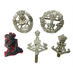 Five cap badges - York & Lancs. Regt., Royal Irish Regt., two Princess of Wales Own Yorkshire Regt. and Green Howards (5)