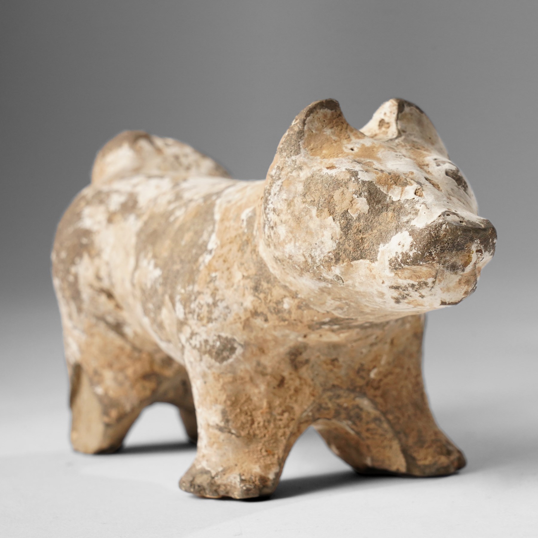 Chinese figure of a dog, probably Han Dynasty, W18cm