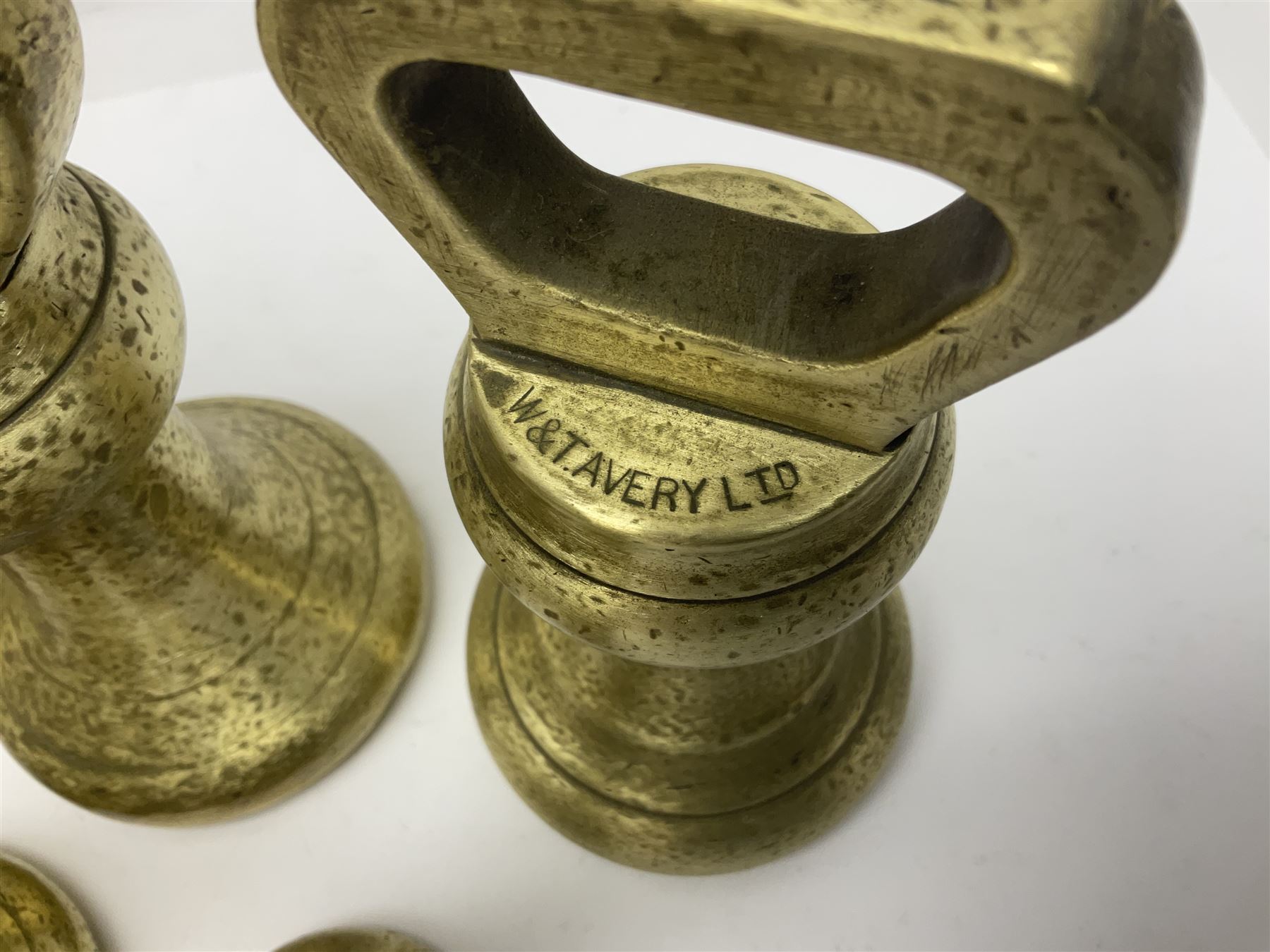 Set of seventeen Victorian brass bell weights