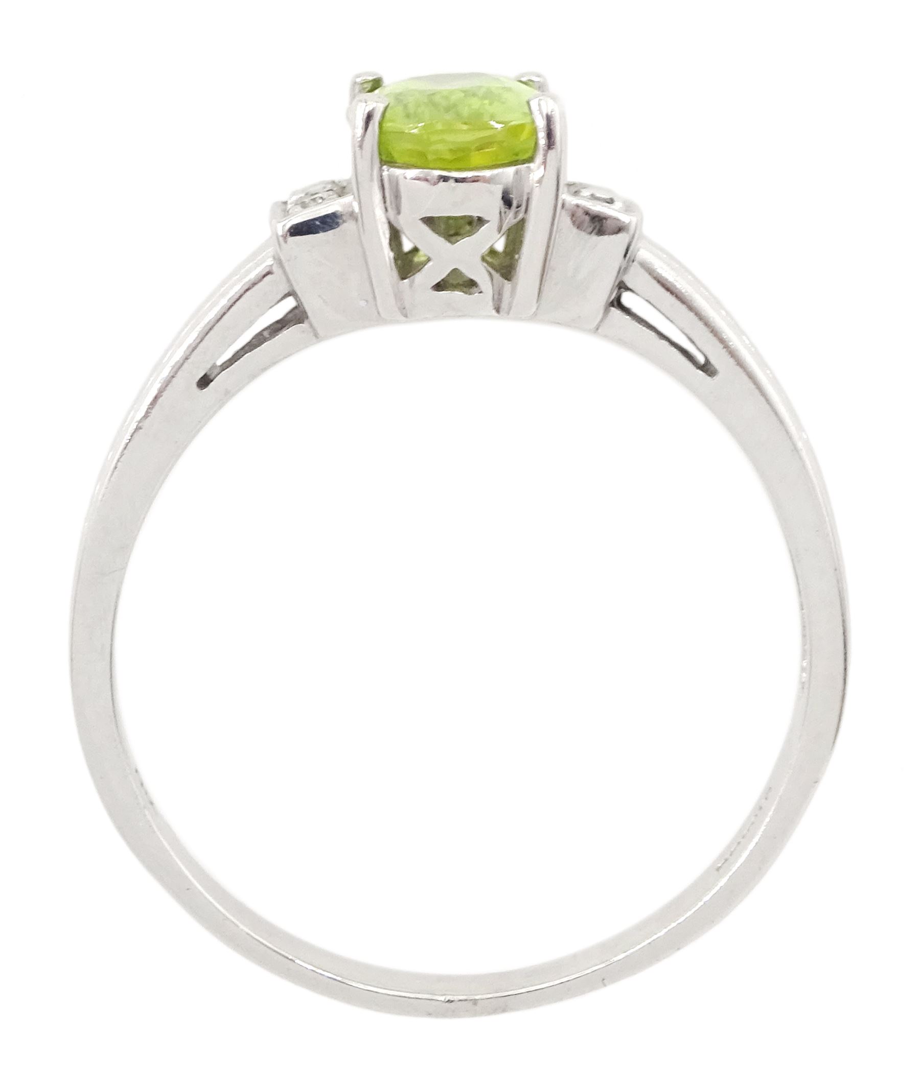 9ct white gold three stone oval cut peridot and diamond ring, hallmarked
