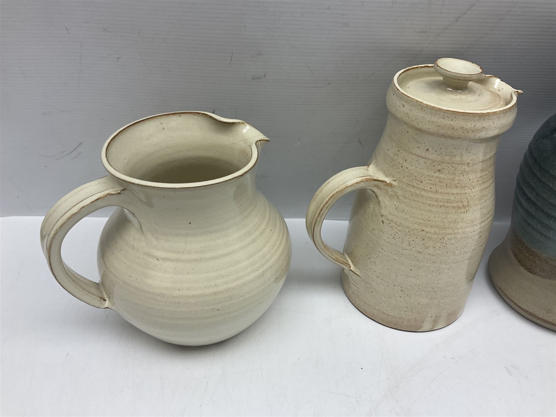 Collection of studio pottery, including Punch set with eight cups, two Paul Murray jugs, dishes, etc 