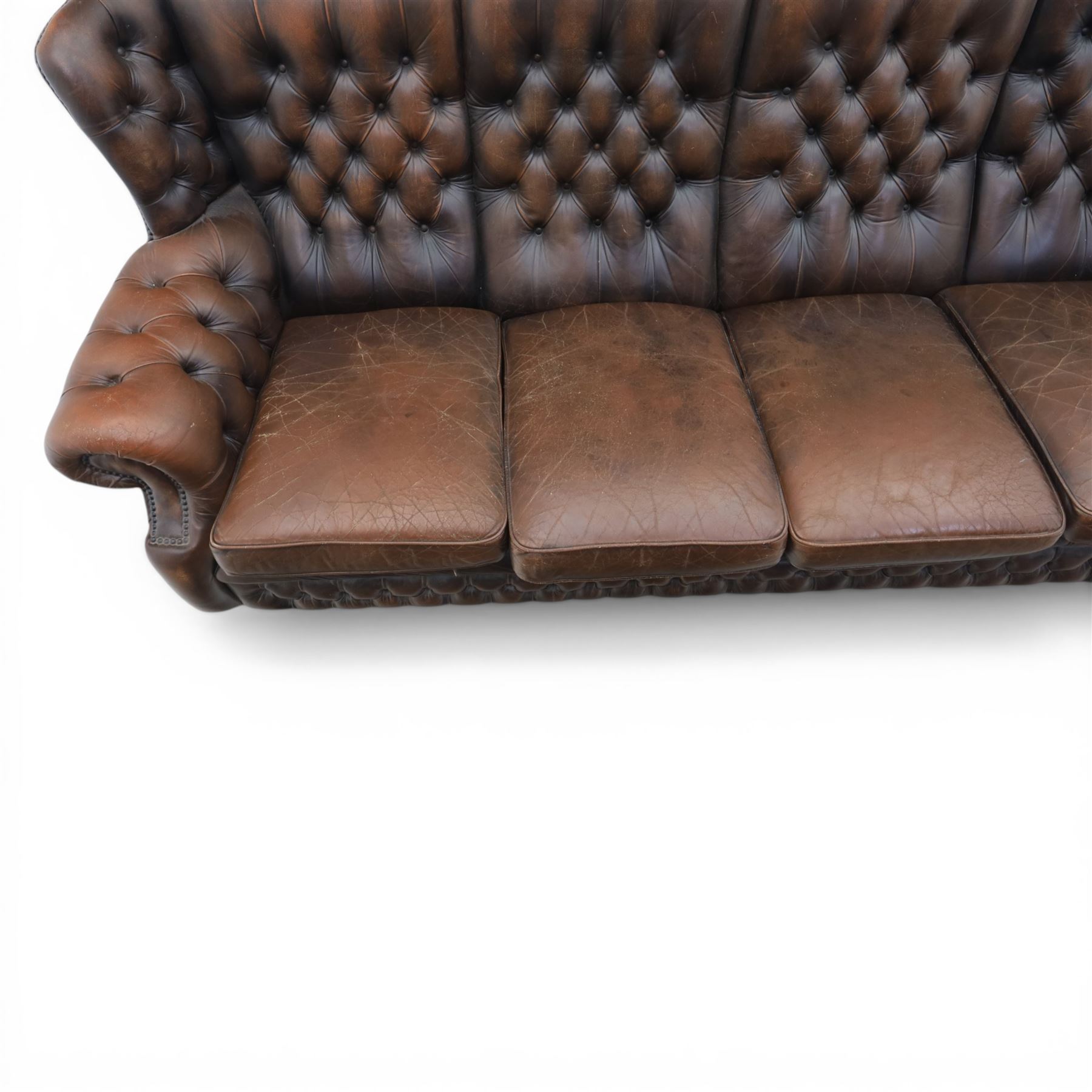 Georgian design Chesterfield lounge suite, comprising highbacked four seat sofa and pair armchairs, upholstered in chocolate brown leather, Armchairs (H 90cm, W 91cm) Sofa (H 91cm, W 238cm)