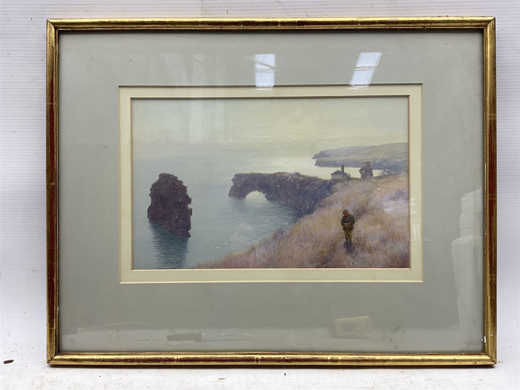 John White (Scottish 1851-1933): A Boy on a Coastal Path, watercolour and gouache signed 17.5cm x 28.5cm 