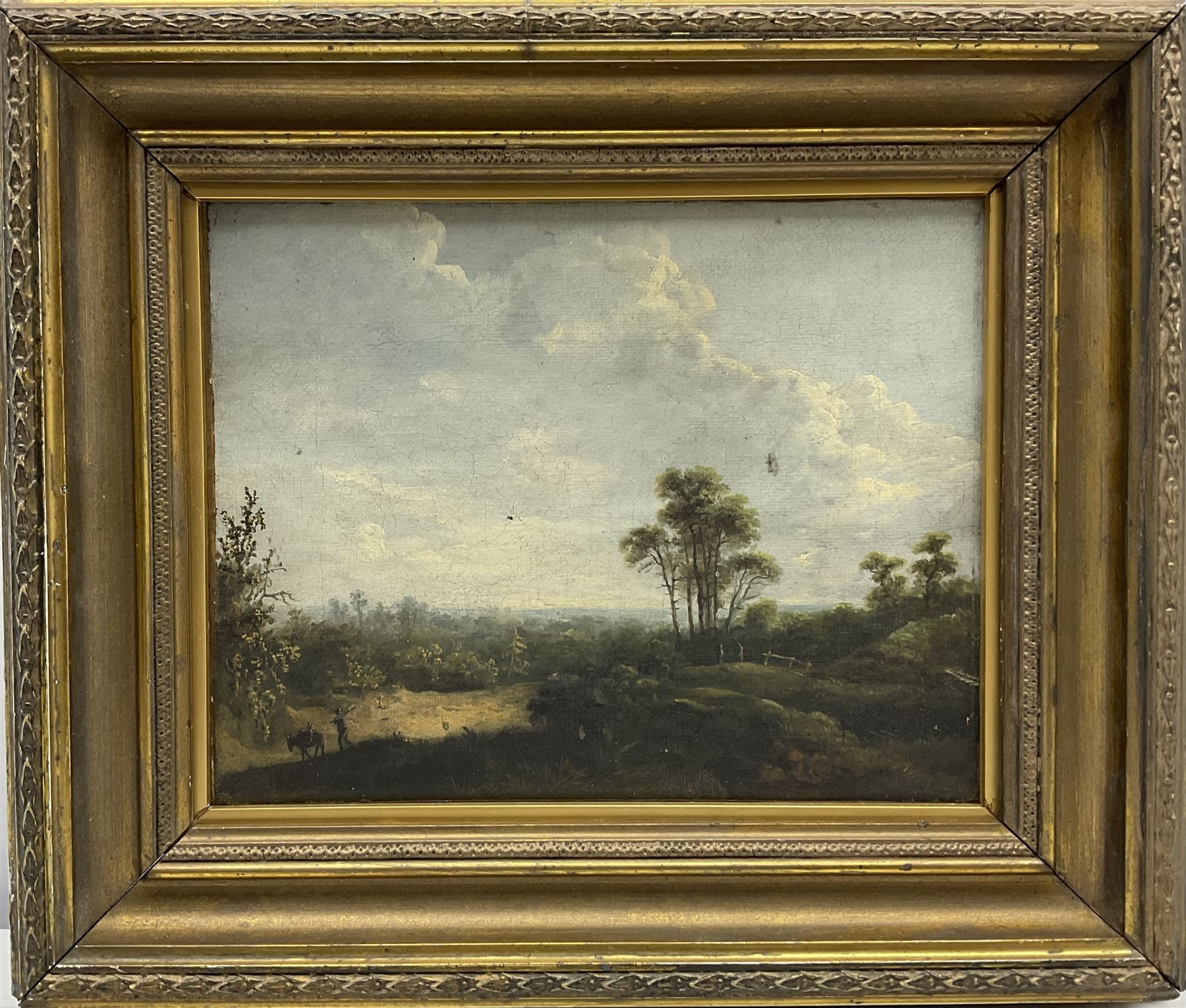 Abraham Pether (British 1756-1812): Figure with a Donkey in Wooded Countryside, oil on canvas signed 18cm x 23cm