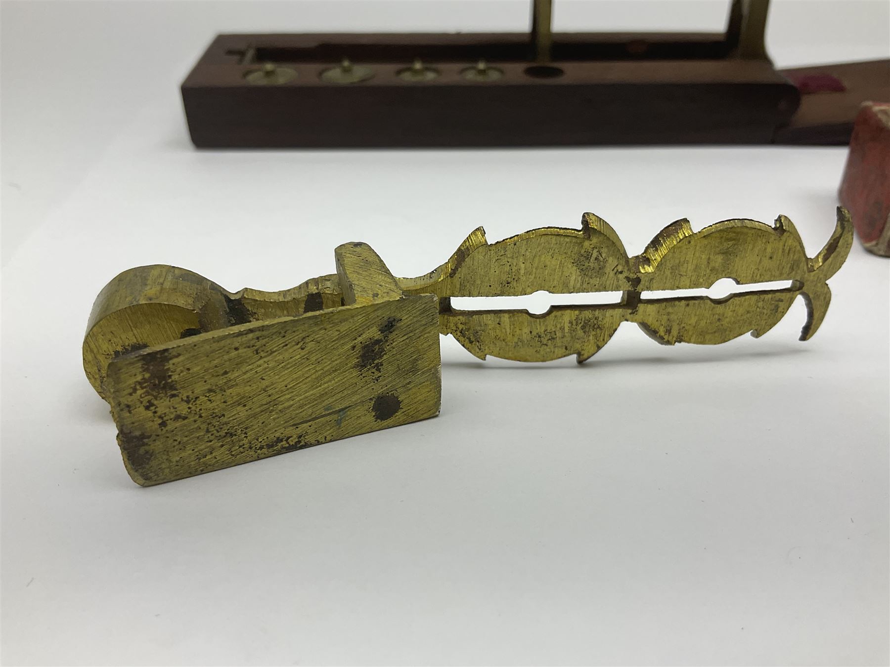 Brass sovereign scales and a part set of Georgian folding sovereign scales (one weight missing)