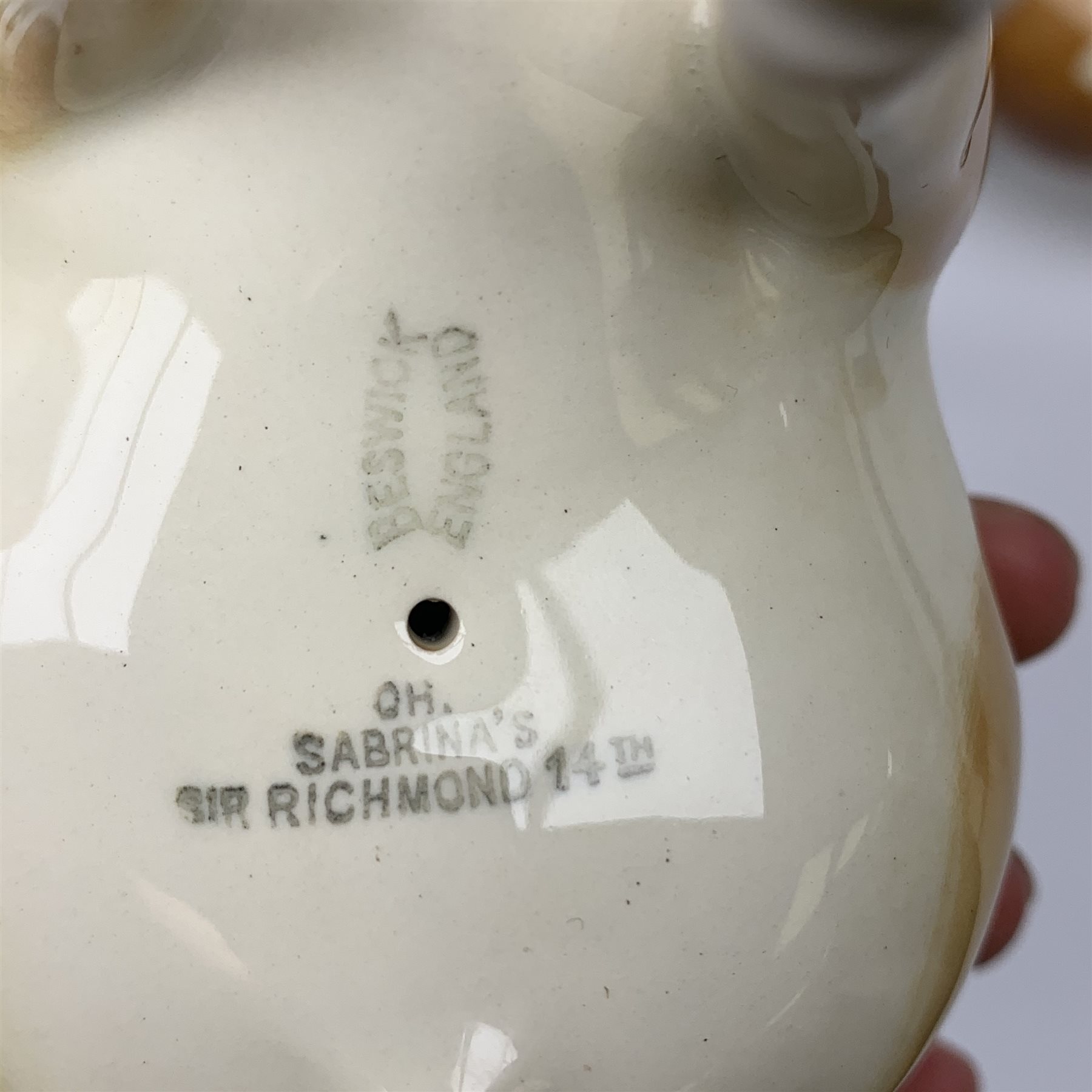 A Beswick Guernsey Bull 1451, marked Ch Sabrina's Sir Richmond 14th, Guernsey Cow, and Guernsey Calf, each with printed mark beneath. 