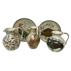Collection of Yorkshire Moorlands Pottery, comprising two large circular dishes and three jugs, decorated with various fish, flowers, red grouse and cockerel