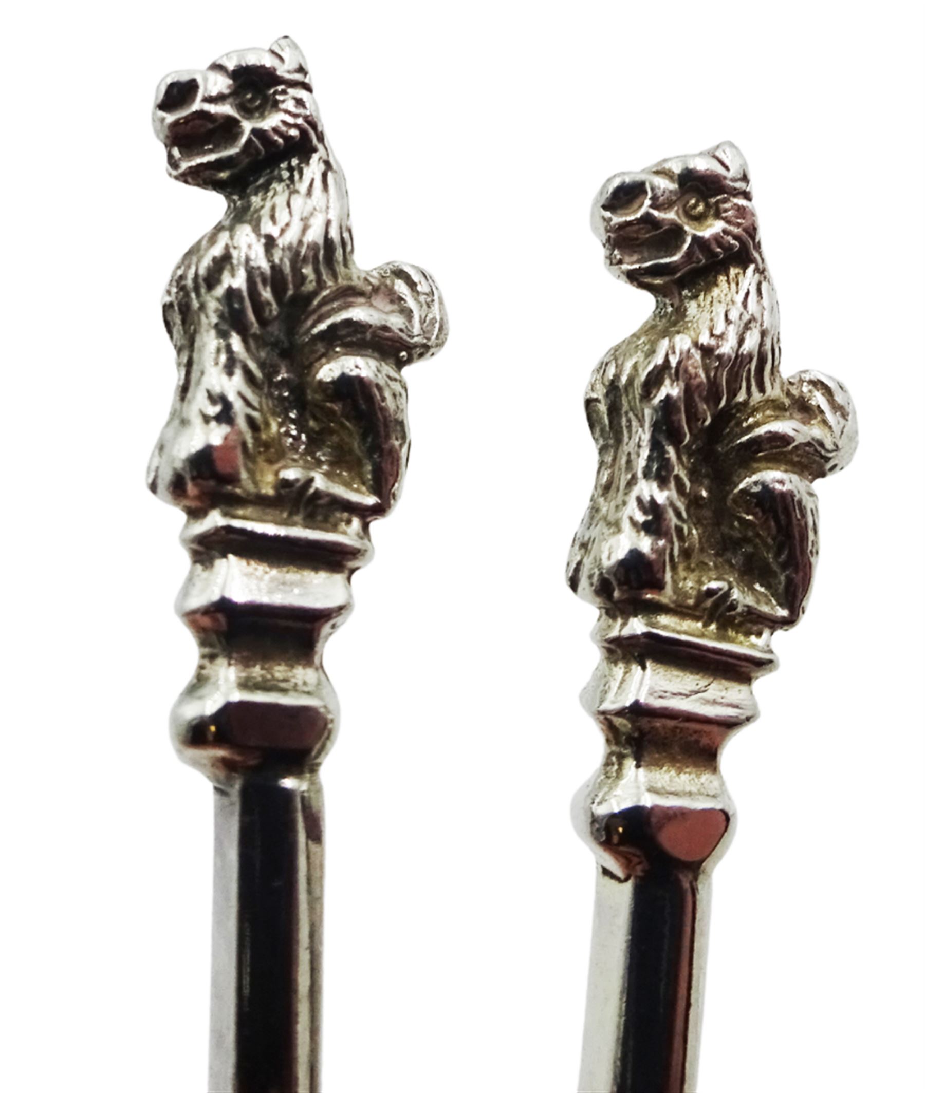 Selection of silver flatware, to include Victorian Queens pattern knife with silver blade, hallmarked John Gilbert & Co, Birmingham 1872, a Victorian silver preserve spoon with shovel type bowl engraved with diamond pattern, hallmarked Josiah Williams & Co, Exeter 1875, two modern coffee spoons, the terminals modelled as griffins, hallmarked William Suckling Ltd, London 1967, an Edwardian Royal Commemorative souvenir spoon, hallmarked William Devenport, Birmingham 1901, a 1930's pair of sugar tongs the bowls modelled as claws, a Norwegian silver spoon, stamped 830, etc., approximate total weight 6.37 ozt (192.8 grams)