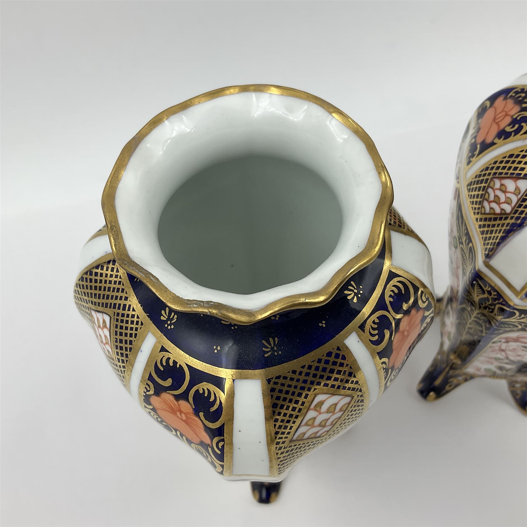 Pair of early 20th century Royal Crown Derby Imari 1128 pattern vases, of tapering straight sided form with waisted neck and frilled rim, upon four splayed feet, with printed and painted marks beneath including illustration date codes for 1911 and 1920, H17cm