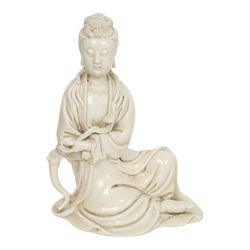 Three Chinese blanc de chine, each depicting Guanyin seated, Dehua province, two with double gourd and potters seal marks to the reverse 
