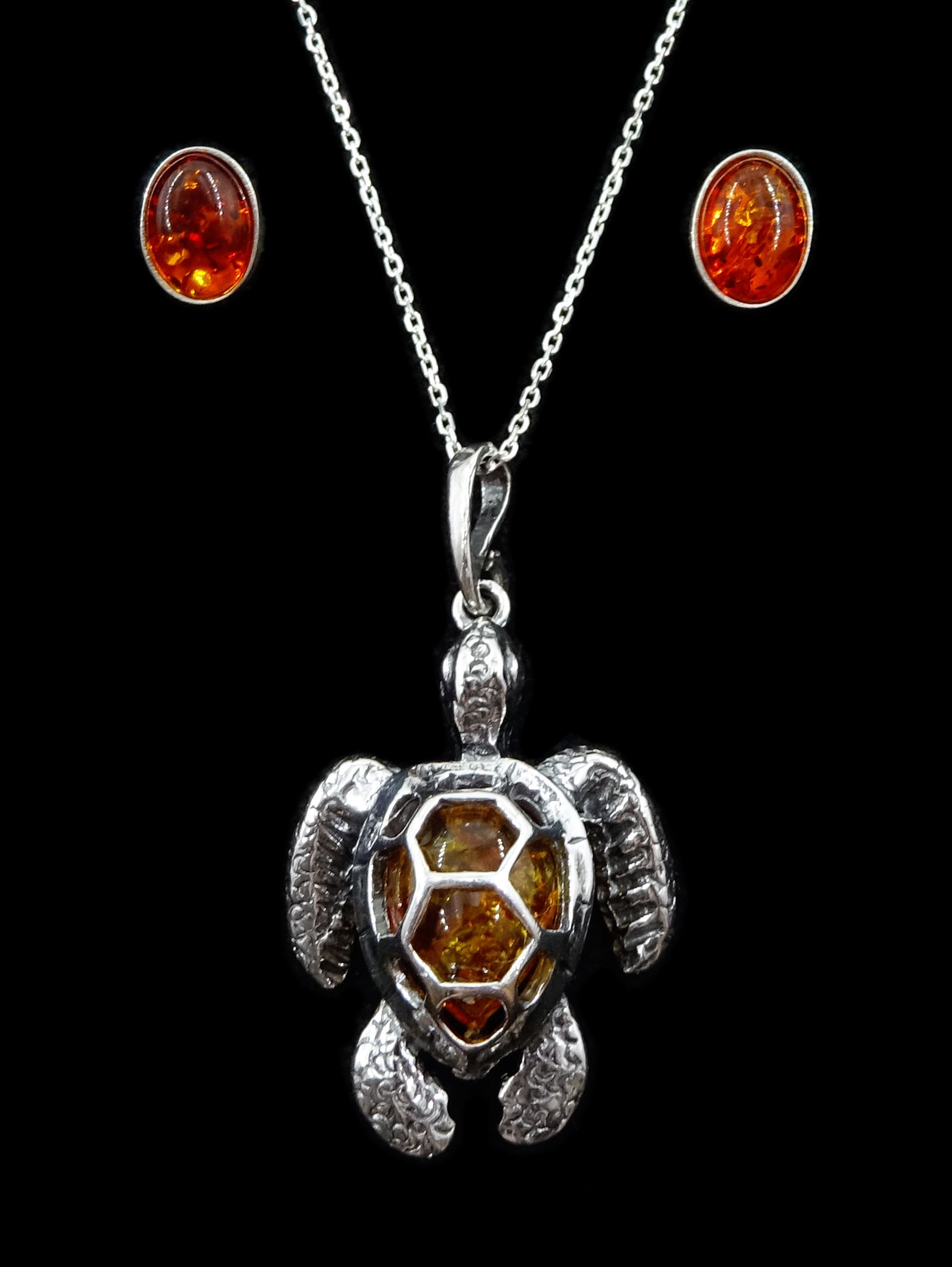 Silver Baltic amber turtle pendant necklace and pair of silver amber oval studs, stamped 925