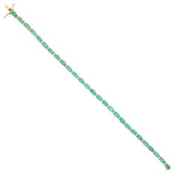 18ct gold emerald and diamond bracelet, twenty-seven oval cut emeralds, each spaced by two...