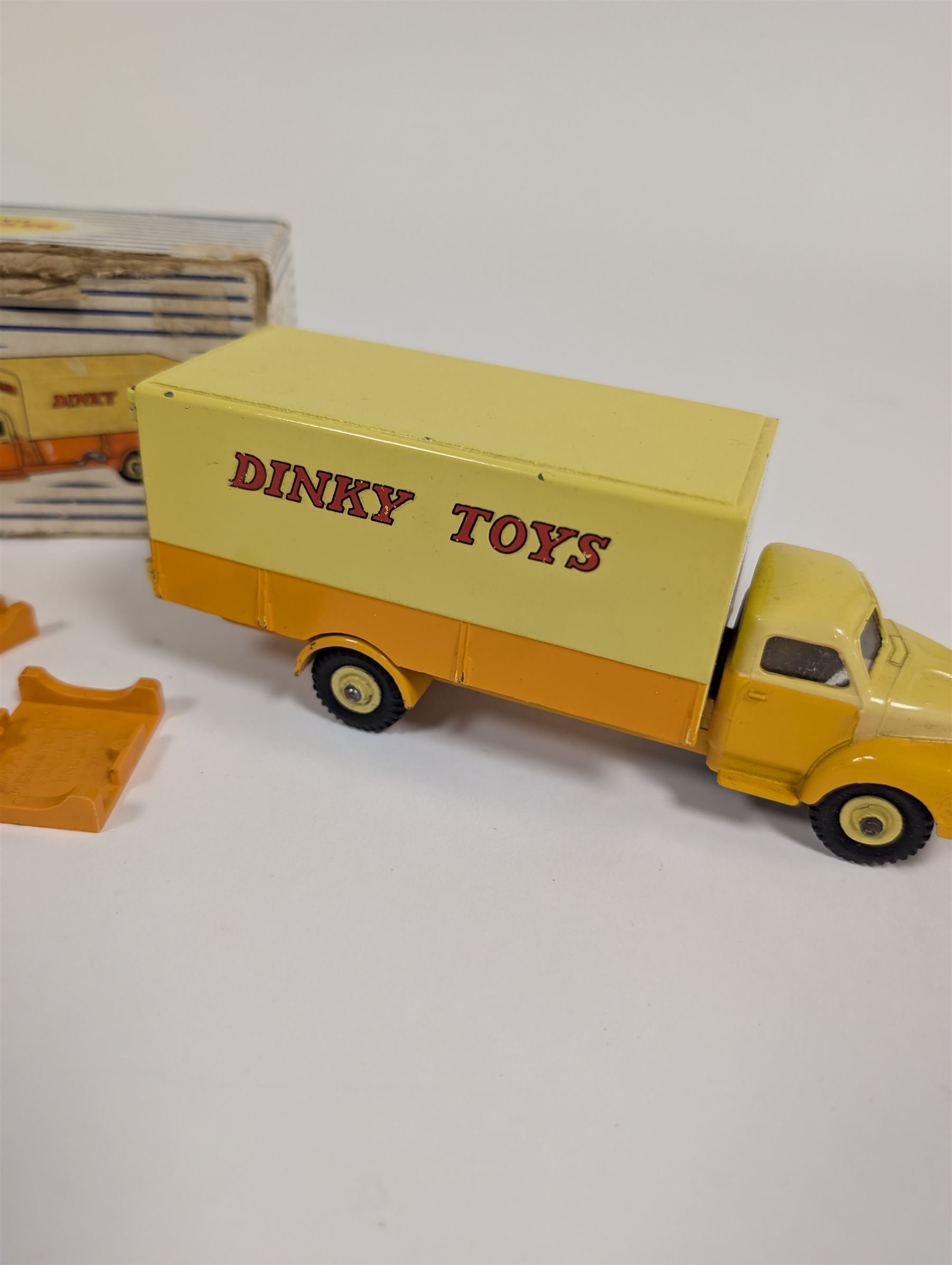 Dinky Toys Bedford Pallet Jekta Van no 930, two tone yellow body with red 'Dinky Toys' lettering, in original box with two orange pallets and instructions