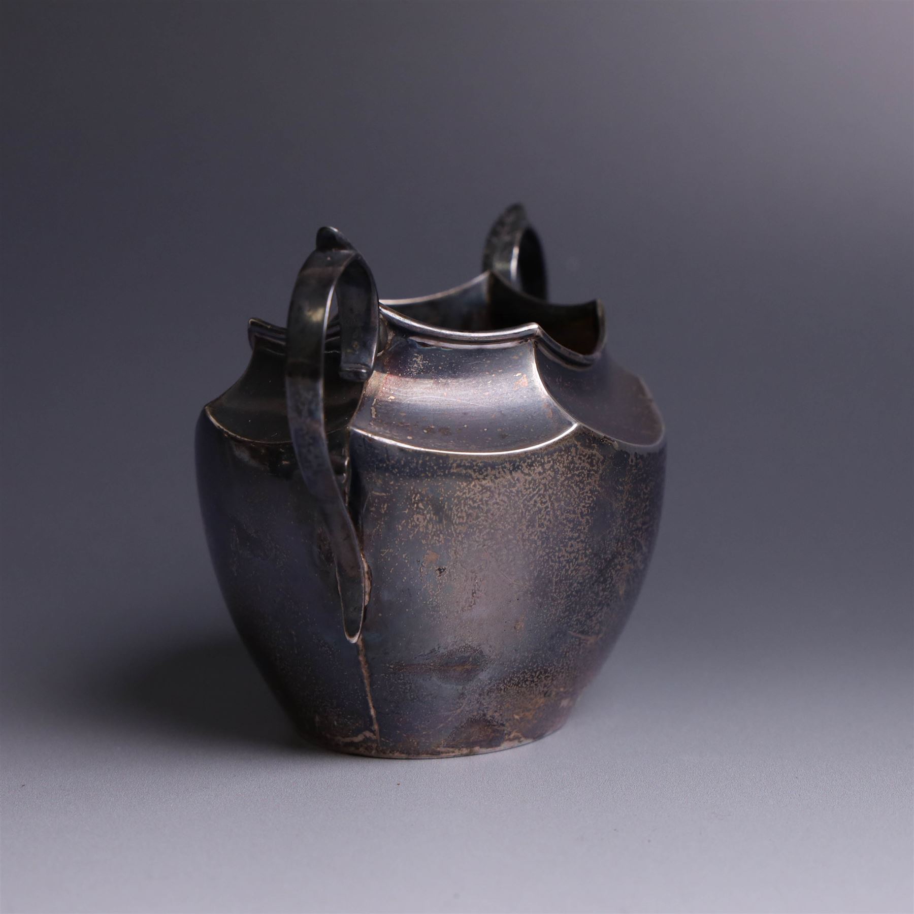 Late Victorian silver twin handled open sucrier, of hexagonal form with acanthus capped handles, hallmarked James Deakin & Sons, Sheffield 1900