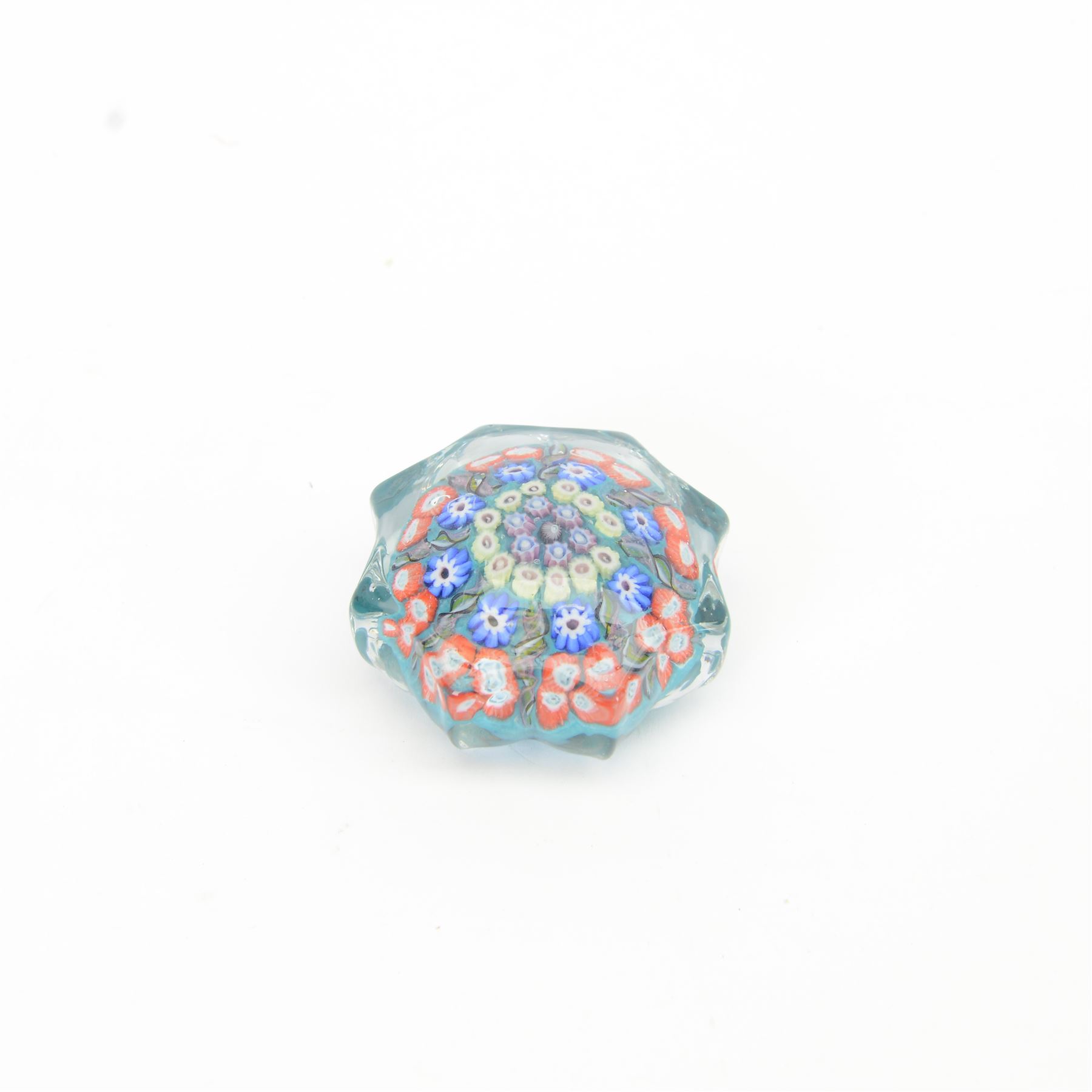 Six millefiori paperweights, two of eight pointed star form, four of domed form