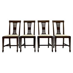 Set twelve (4+8) Edwardian inlaid mahogany dining chairs, cresting rail with satinwood banding, pierced splat backs with central inlay, drop-in seats upholstered in foliate patterned ivory fabric, raised on square tapering supports terminating in spade feet