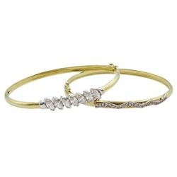 Two 9ct gold cubic zirconia bangles, both hallmarked