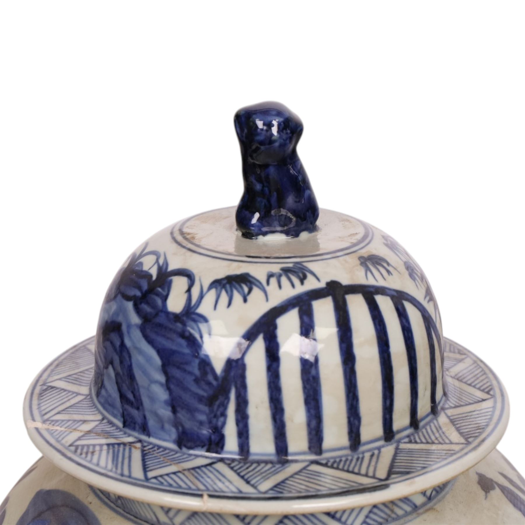 Pair of blue and white Chinese vase and cover, of baluster form, decorated with dragons, the cover with a fo dog finial, H15cm