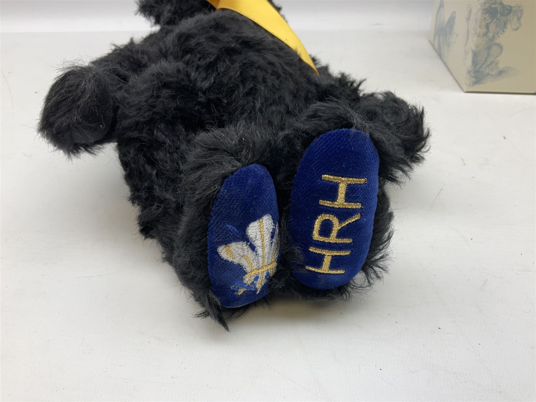 Steiff Special Edition Prince Charles black bear, with HRH coat of arms on foot and growler mechanism, with white tag ear label, in original box, together with Steiff 'Yorkshire Tyke' bear with rose on foot