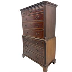 19th century inlaid mahogany chest on chest, projecting stepped cornice over canted corners with fluting, fitted with three short and six long graduating drawers, cockbeaded drawers with satinwood band, on bracket feet